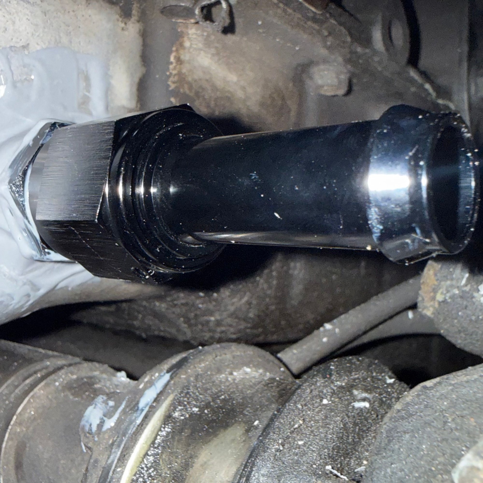 It ain�t pretty, but it is drilled, tapped, and JB Welded on. 