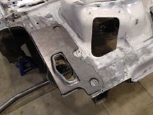 Test fitting my plate - that cutout on the right side is for the stock fuel tank inlet cover.