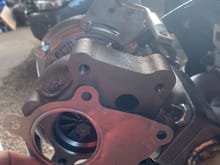This is the gasket that came with the MK turbo kit, it will not work with the wastegate since it obviously covers the whole. on another porst someone recomended to use high temperature bearing grease as a gasket, has anyone heard of this? or do you have any other sugestions??