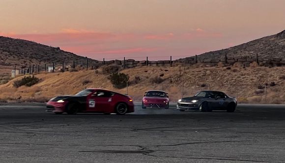 At the end of the final session, two of my buddies and I were the last cars on track. We’d been just having fun for most of the session, practicing open passing in corners and trying to gain a little additional experience driving in a tight formation (ok, we were f*cking around. I trust both of them, though). The checkers come out 