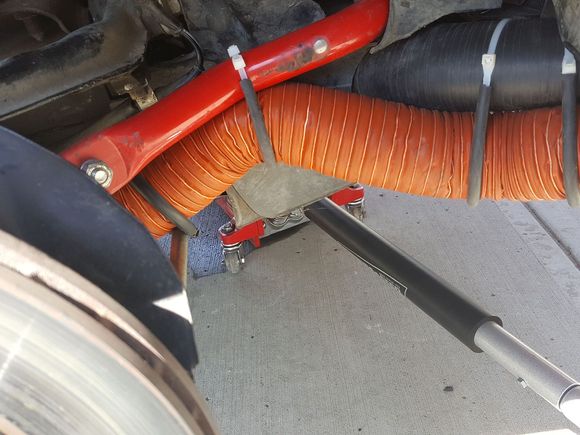 Due to differences in intercooler hose length, I had to bridge the longer gap by attaching to the anti-roll bar