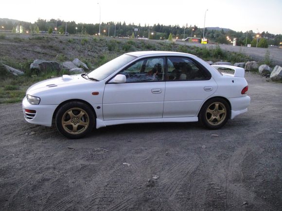 1998 STI with brand new Yokohama AD08Rs. I impoted it and sold it to a buddy who took it to the Ridge and lots of track days.