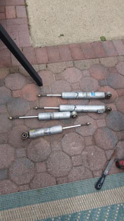 Started out by sanding the rust off the shocks and getting ready to paint them