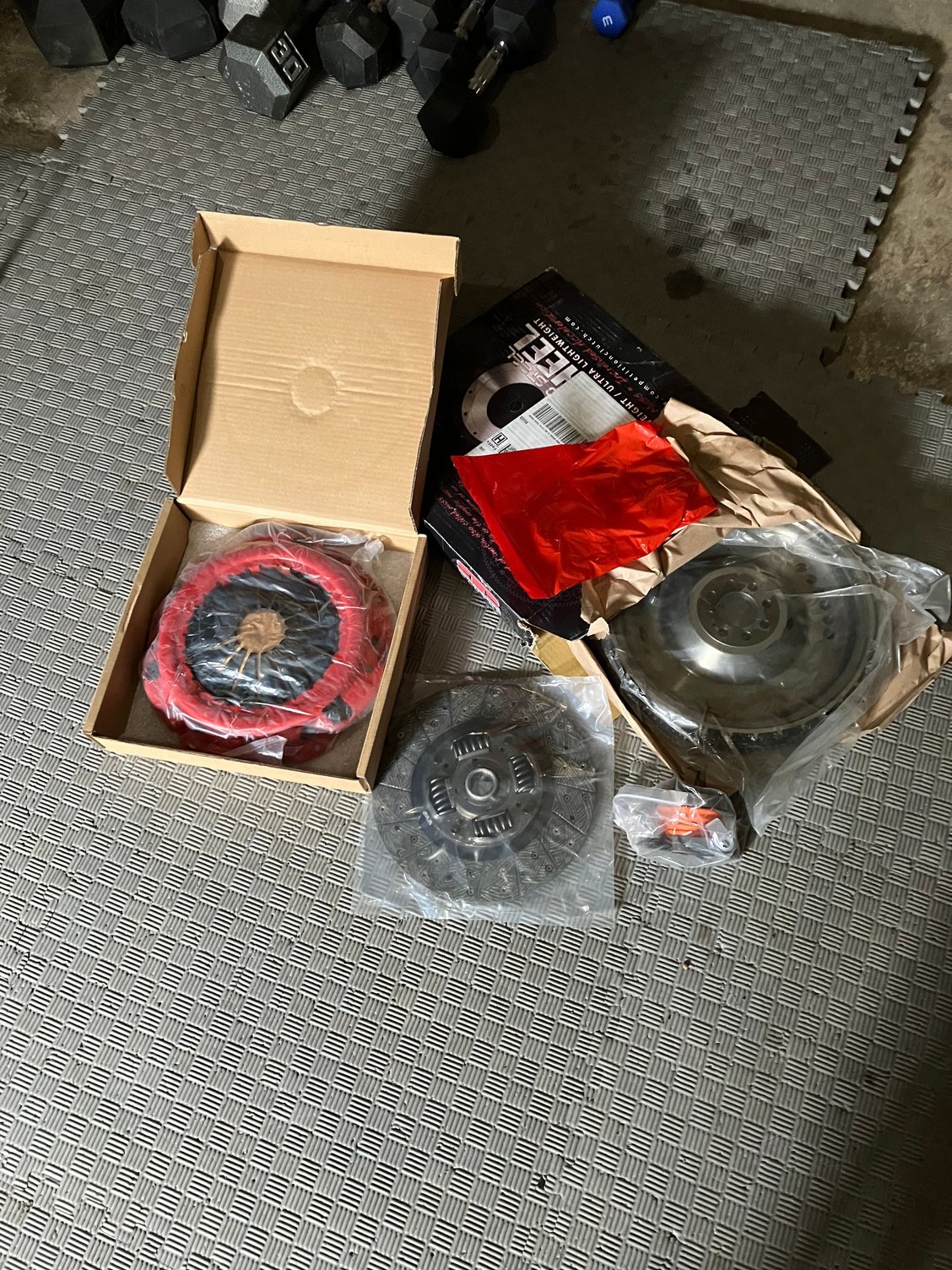 It�s that time! I have the z1 clutch and pressure plate, iron flywheel weighing in at 27lbs (I don�t want the chatter) JIT CSS and a new transmission mount that I forgot to put in the picture. In the next few months I�ll get rid of the ugly red shift boot, install a short shifter and a new shift ****