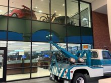 Check out the 2000s SVT Cobra upstairs and the tow truck.