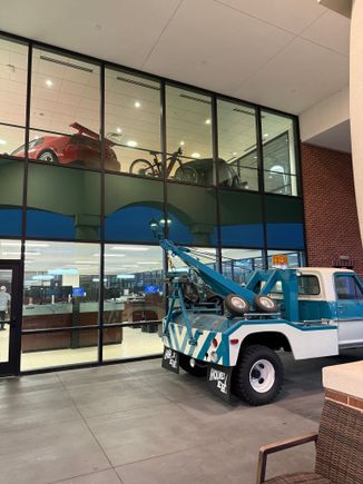 Check out the 2000s SVT Cobra upstairs and the tow truck.