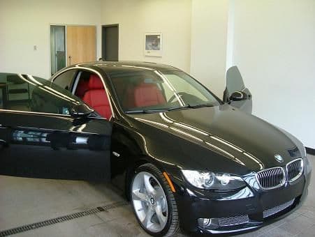 Black 335i with coral red interior.
