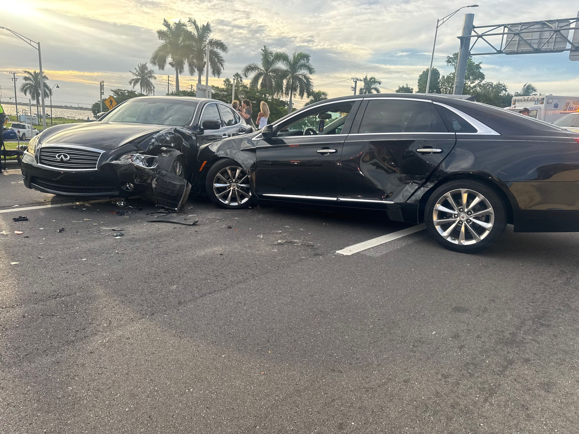 The black Caddy came up and over the bridge hot, like 100+ mph. The infinity and myself both sitting at the light, she was one car behind me on the right and she had a truck in front of her. The caddy locked them up when he finally realized the light was red. If he didn�t cut his wheel to the right when he did, I would be in a world of pain right now. Infinity rushed to hospital, she was out, but luckily there was a nurse that saw it happen and stuck around.