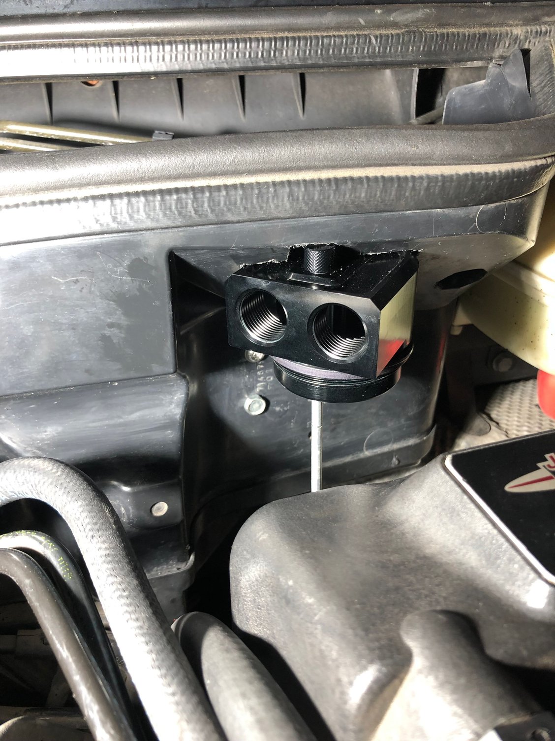 Not sure how this will work out on my next oil filter change, but I figure rotating this cap to the right should give enough space