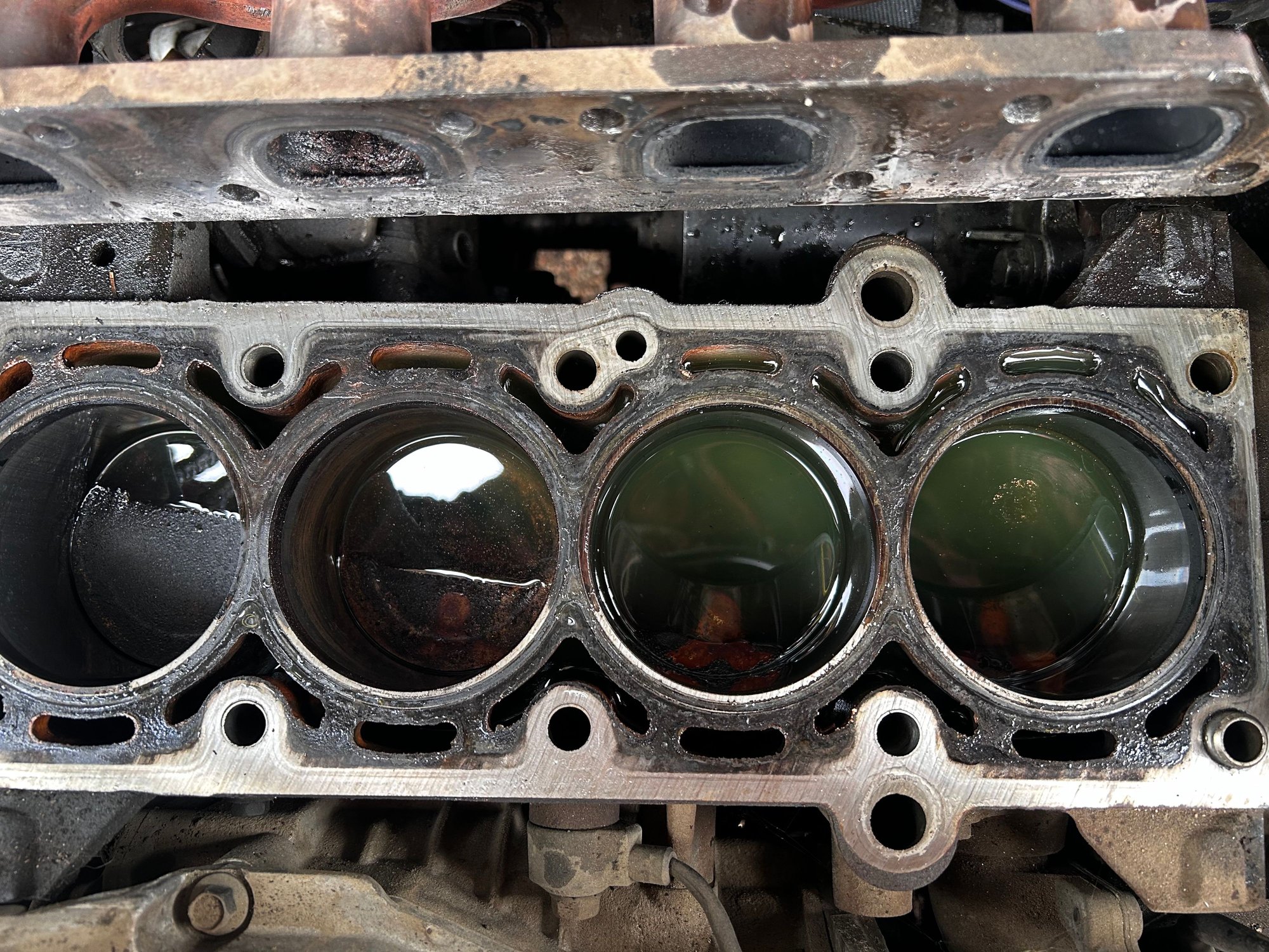 Cylinders full of coolant w/ K Seal in it