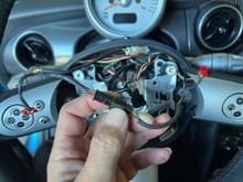 
These are the wires to the paddle shifters. I have red tape on the two ends. What should I try connecting?