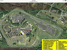 This map that IMSA just sent out says your on the outfield hill, above the footbridge..