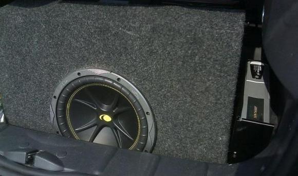 In-Car Entertainment Image 
Kicker C10 10" 300W subwoofer; Alpine CHA-S634 6-disc CD/MP3 changer.