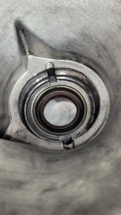 That's a bearing race and a driveshaft seal