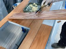 Epoxy adhesive after cleaning of the back side of the team with acetone