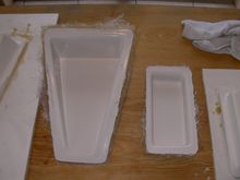 on the flange and rear lower corners of the triangle duct, the gel is damaged. but the flange will get ground down when they get bonded into the hatch.  also the hoses will connect in the lower corner so it should be fine.