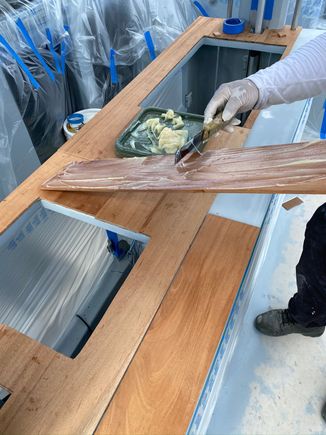 Epoxy adhesive after cleaning of the back side of the team with acetone