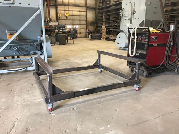 I built some carts that support the boat under the strike just as the trailer does. I was going to put these under the boat to get it as low as possible to the ground to be able to rig the motors inside the 14’ tall ceiling barn.