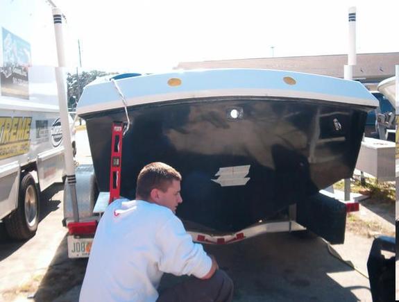 this is me.. matt, waiting for the jig to drill some holes back in the boat. 