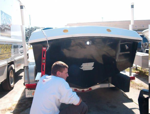this is me.. matt, waiting for the jig to drill some holes back in the boat. 
