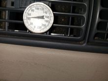 This is the center vent, 10 minutes after shutting off the 16" puller fan. Still colder than the R134a stock system ever though about being.  I think it ran about 56°F at idle in this heat when it was NEW!