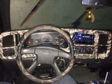 Kenwood deck, Rockford 6.5 in speakers, mossyoak vinyl wrap.