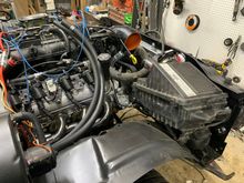stock tahoe air box with K and N drop in filter. still gotta build brackets for it and mod the water neck on the water pump.