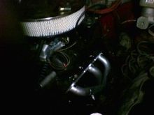 2.8L v6. Edelbrock intake. Holley 4bbl carb. Hedman Hedders. MSD ignition. K&amp;N filter (not pictured). Electric fan. . and I could have spent the money on just dropping in a V8. oh well, live and learn.