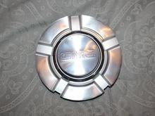 Chevy center cap w/ GMC center cap to replace the bowtie (both w/o paint)