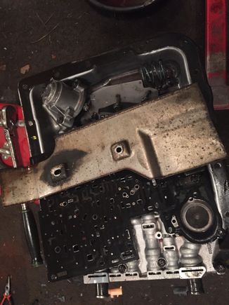 Valve body and accumulator stored neatly in the pan.....