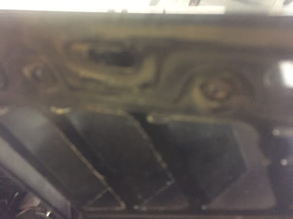 Pic sucks, but bolts are out, a little heat and a stud extra tor and the came right out through the inner wall of the fender....