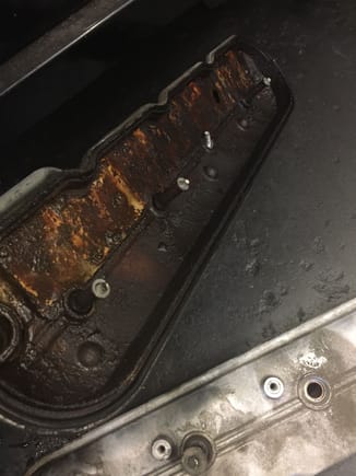 This is what the inside of a valve cover is NOT supposed to look like