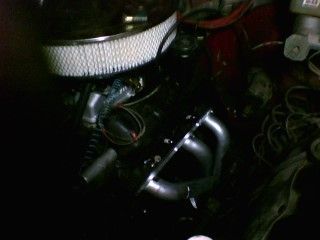 2.8L v6. Edelbrock intake. Holley 4bbl carb. Hedman Hedders. MSD ignition. K&amp;N filter (not pictured). Electric fan. . and I could have spent the money on just dropping in a V8. oh well, live and learn.