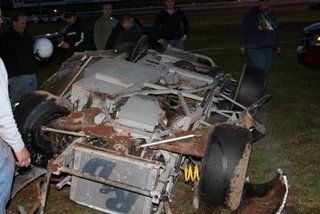The Night gets better, after I leave in an ambulance, a friend who drives in a series above this took the car out to see how it was working as they were due to depart every weekend after this and well their help could have been beneficial had the car not got into the air, nose over nose 3 times before resting on it's roof, driver ok, it pays to have your safety devices even if they cost 2k, if you can't afford them, you shouldn't be racing is my take on it.