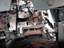 Here is the passenger side engine mount, you have to jack up the mount to get to them.