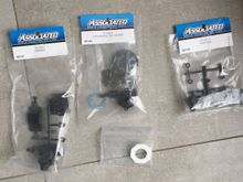 B74 Center diff kit 
B74 rear hubs 
B74 gear box case 

NIP