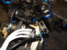 Here is a fan mount pic using the Associated servo mount with a longer screw through the side brace. 
