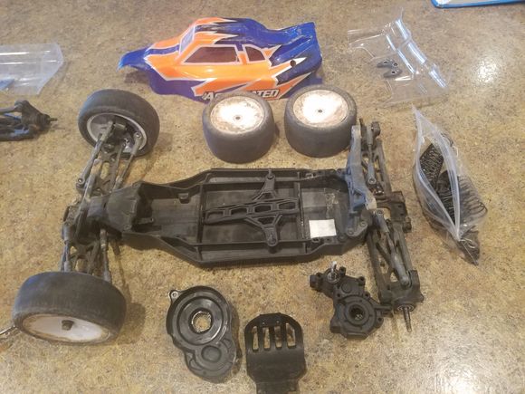 missing shocks missing the diff and battery hold down nutsand motor plate (ill look to see if i can find it)