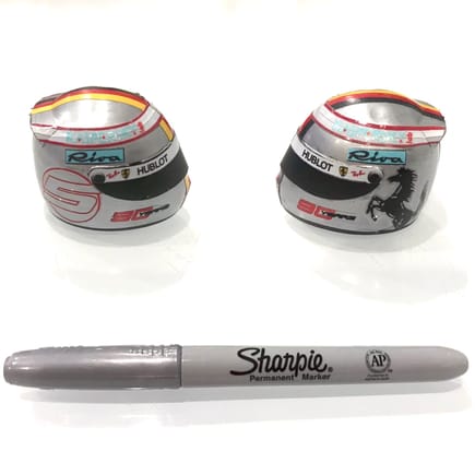 F1 Helmet handy color tip is to use a Silver Metallic Sharpie to paint your helmet a certain color. Its much more durable than using standard paint and easier to work with. You can also mask out certain sections for decals or even the visor, which is stock black