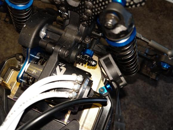 Here is a fan mount pic using the Associated servo mount with a longer screw through the side brace. 
