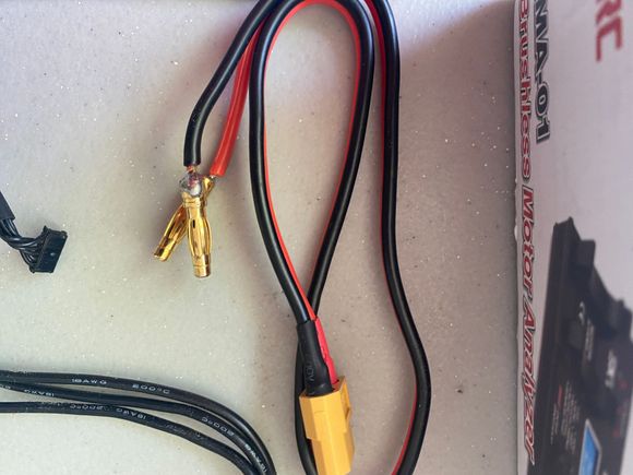 Batter cable has 4mm bullet connectors. 
