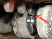 Guide teeth hitting return roller “axle” causing grinding sound. The guide teeth are hit all the return roller as shown here. 