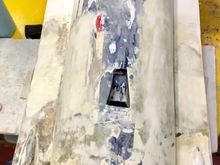 Filling with fiberglass cloth between layers of laminating epoxy. And of course a lot of sanding 