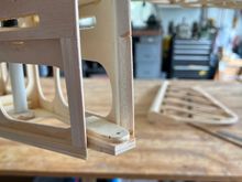 Bottom hinge plate atop a balsa wedge. 