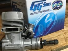 With original muffler and spinner adapter.