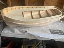 Port Railing sanded down after being epoxied.  Starboard railing is epoxied.