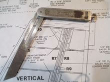 I'm using a bevel gauge to replicate the angle.  This bevel gauge is very special to me as it belonged to my grandfather who was a general contractor.  I think about him every time I use it...