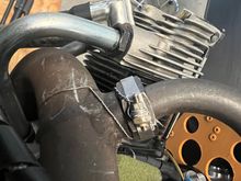 Stainless safety wire with an extra loop for proper pull direction.  Sweeeeeet!