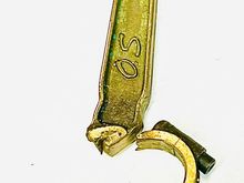 A photo of my broken rod.Note screws are soundly intact.
Note stretched big end and dented sides from striking sides of cylinder opening as the big end opened prior to letting go.   The added mass takes its toll.
   The crankpin journal showed no signs of bearing stress.A used set of aluminum rods were fitted and AFAIK the engine is still fine.  

      All of the aluminum rod failures I know of showed definite signs of bearing failure. Metal transfer, scoring and heat discoloring. Who knows?