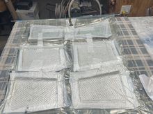 Flap and rudder molds in the vacuum bag.  20” of vacuum